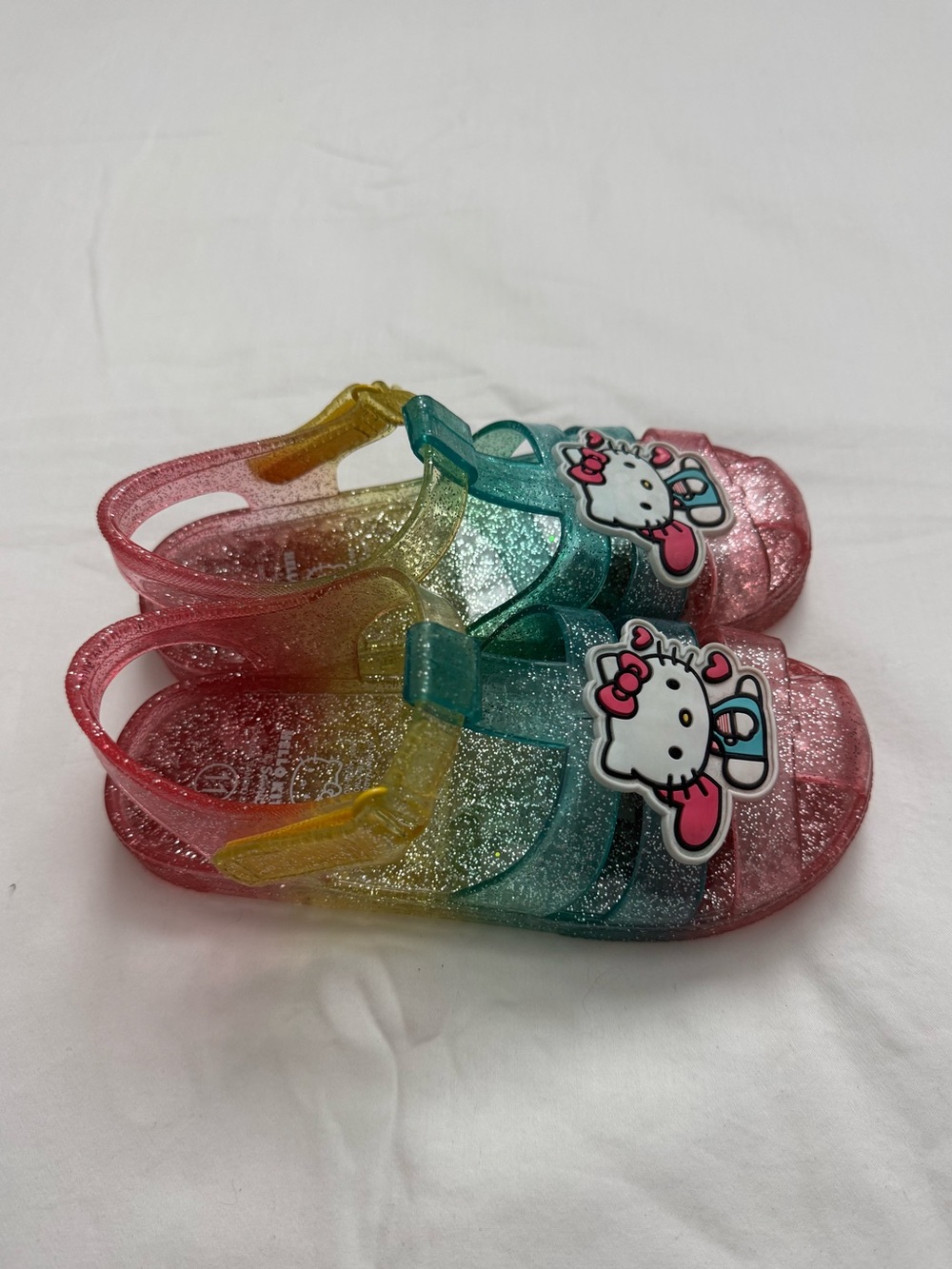 Kids Glitter Jelly Sandals with Hello Kitty Accent - Pink, Teal, Yellow - Picture 2 of 4